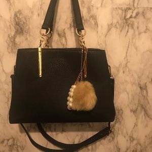 Small black purse with versatile straps